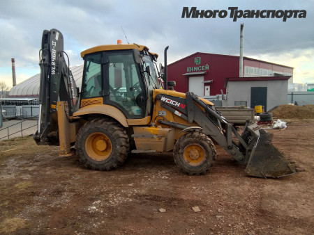 Экскаватор-погрузчик NEW HOLLAND Вечай